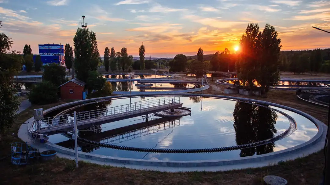 A sunset image of wastewater treatment plant.