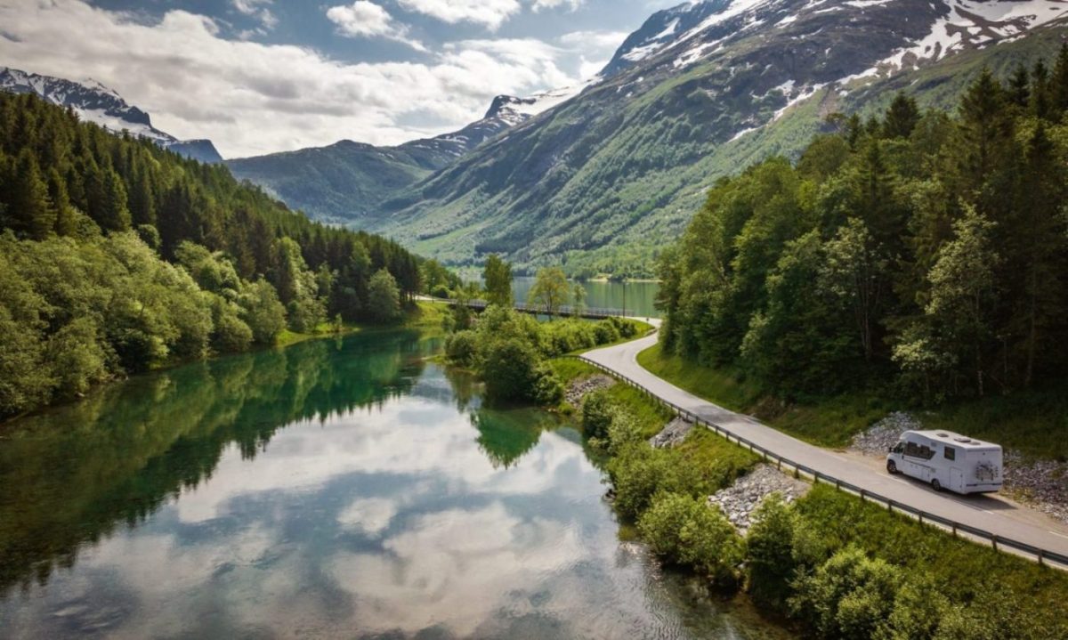 Aerial View of an RV traveling around the Eikesdalsvatnet Lake in Vestland County Norway