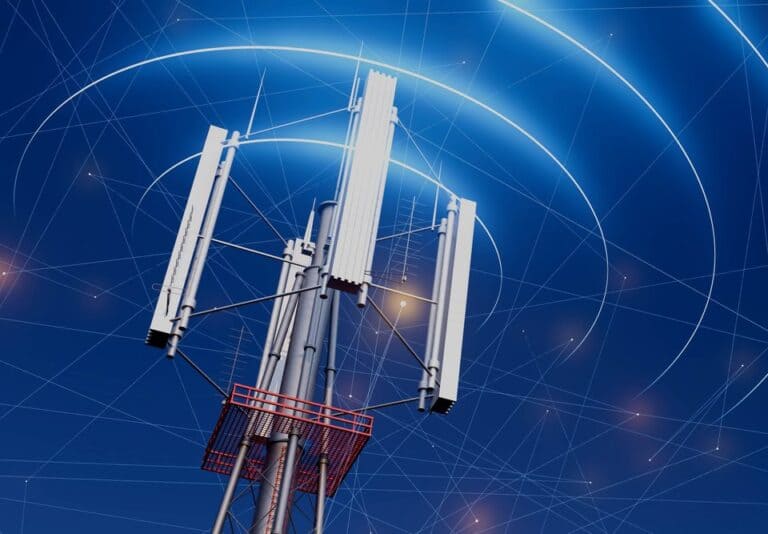 Cellular communication tower with digital network graphics in the background.
