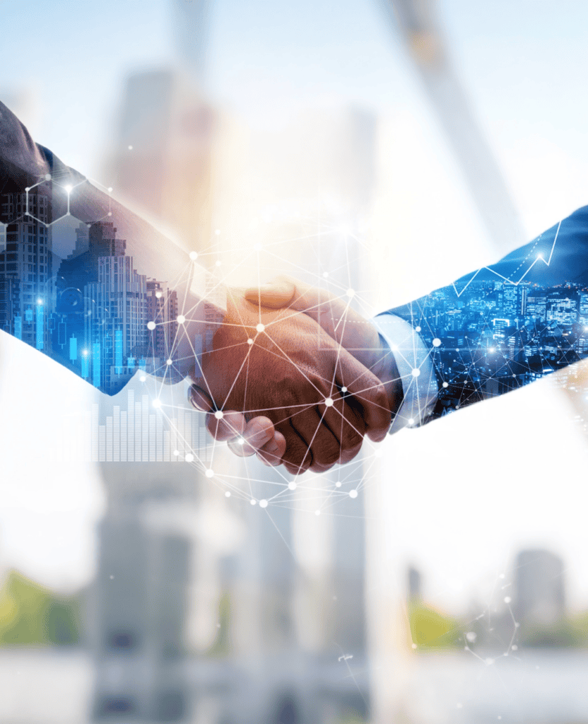 Connected business professionals shaking hands with digital network overlay, representing IoT connec.